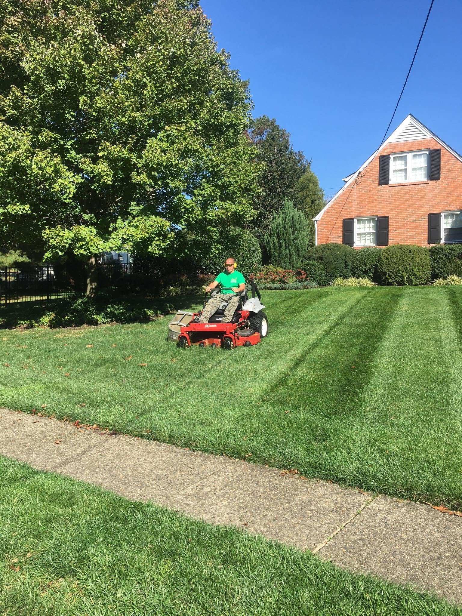 Mowing and striping a customer's lawn